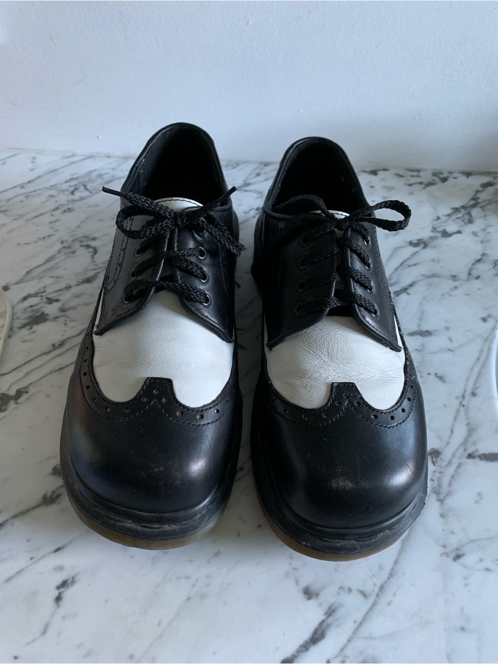 Woman’s Dr. Martens Black and White Two-Tone Wingtip Oxfords
